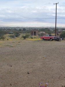 Desert Property with Vintage Red Car